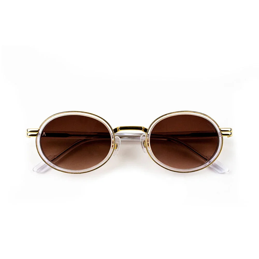 Adam Young Eyewear marka şeffaf çerçeveli oval kahverengi camlı AD 013 güneş gözlüğü