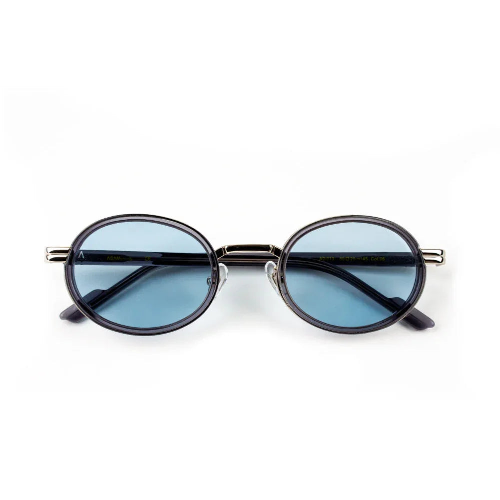 Adam Young Eyewear markasına ait mavi camlı AD 013 güneş gözlüğü oval çerçeveli